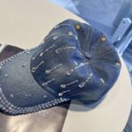 Blue-washed-denim-baseball-cap-with-a-dense-rhinestone-encrusted-brim-and-sparkling-clear-teardrop-crystal-studs-arranged-in-lines-on-the-crown-2