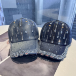 Blue-washed-denim-baseball-cap-with-a-dense-rhinestone-encrusted-brim-and-sparkling-clear-teardrop-crystal-studs-arranged-in-lines-on-the-crown-2