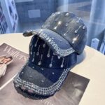 Blue-washed-denim-baseball-cap-with-a-dense-rhinestone-encrusted-brim-and-sparkling-clear-teardrop-crystal-studs-arranged-in-lines-on-the-crown-7