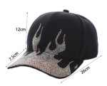 White-baseball-cap-featuring-a-shiny-crystal-rhinestone-flame-pattern-on-the-front-and-brim-placed-on-a-wooden-table-1