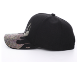 White-baseball-cap-featuring-a-shiny-crystal-rhinestone-flame-pattern-on-the-front-and-brim-placed-on-a-wooden-table-2