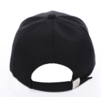 White-baseball-cap-featuring-a-shiny-crystal-rhinestone-flame-pattern-on-the-front-and-brim-placed-on-a-wooden-table-3