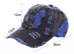 Wholesale-washed-black-denim-baseball-cap-with-custom-distressed-ripped-holes-revealing-a-bright-blue-underlayer-displayed-for-bulk-clothing-supplier-3