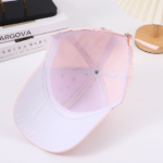Wholesale-white-cotton-baseball-cap-with-custom-colorful-oval-rhinestone-and-mini-crystal-stud-embellishments-displayed-for-OEM-bulk-supplier-catalog-1