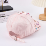 Wholesale-white-cotton-baseball-cap-with-custom-colorful-oval-rhinestone-and-mini-crystal-stud-embellishments-displayed-for-OEM-bulk-supplier-catalog-9