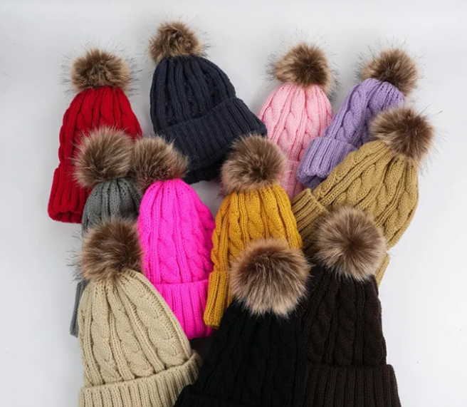Red-cable-knit-winter-beanie-hat-with-a-fluffy-fluffy-faux-fur-pom-pom-and-cuffed-brim-for-custom-logo-wholesale-2